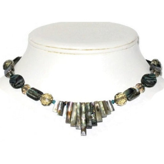 Choker-style necklace with black, gold, and silver beads on a white mannequin.