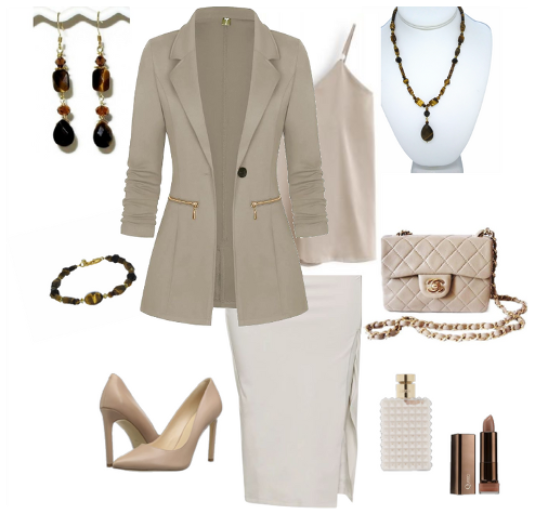 Fashionable outfit with beige blazer, skirt, and matching jewelry and accessories on a white background