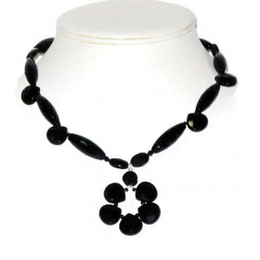 Black onyx beaded necklace with a flower-shaped pendant on a white mannequin