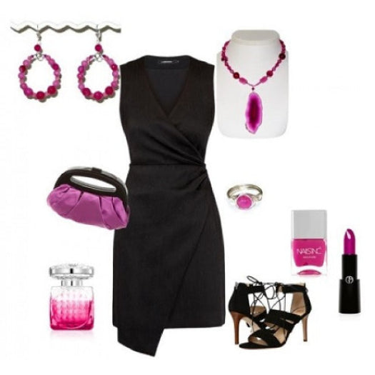 Black dress with pink accessories including earrings, necklace, lipstick, and nail polish on a white background