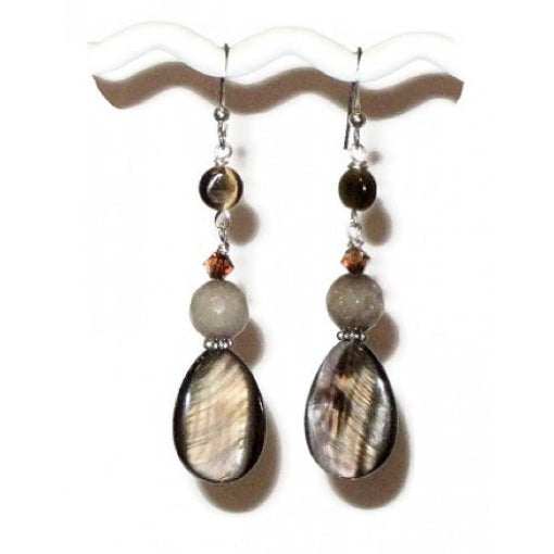 Pair of brown dangle earrings with teardrop-shaped mother-of-pearl beads and faceted jade-style gemstone beads on a white background