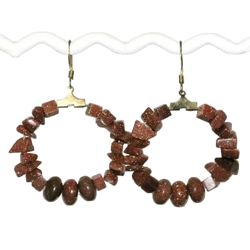Pair of brown goldstone gemstone beaded hoop earrings with brown gemstone beads on a white background