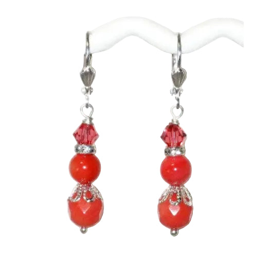Red coral beaded earrings on a white background