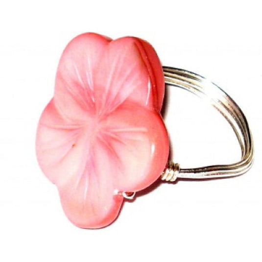 Pink coral flower-shaped mother-of-pearl shell wire-wrapped ring in silver -tone wire on a white background