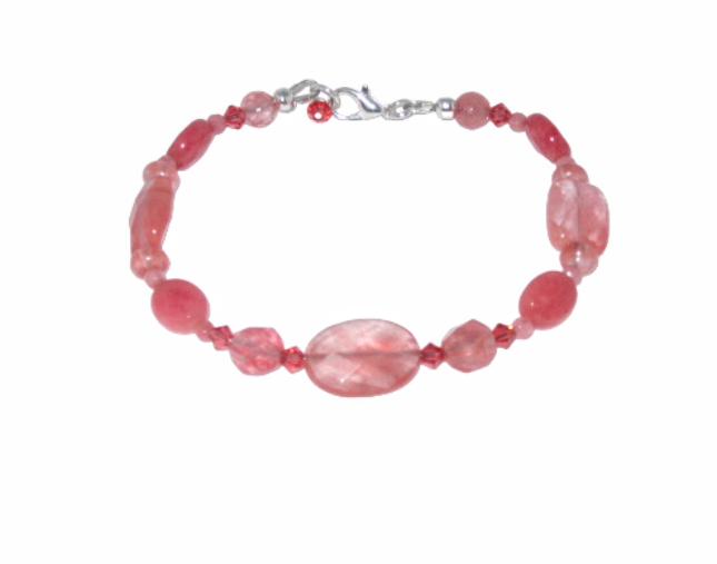 Pink cherry quartz beaded bracelet with silver clasp on a white background