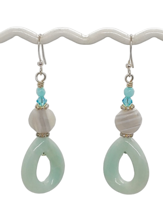Pair of mint green, aqua, white and gray beaded dangle earrings made with gemstone beads on a white background