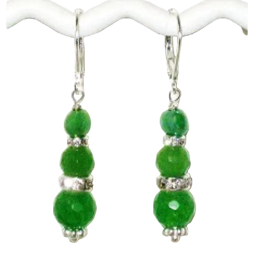 Green beaded dangle earrings on a white background