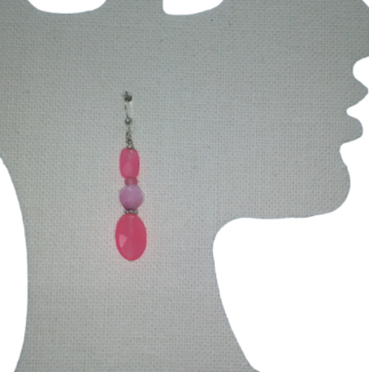 Pink beaded dangle earring on a mannequin silhouette against a white background