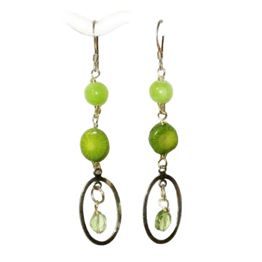 Lime green beaded dangle earrings with gold-filled oval-shaped components on a white background