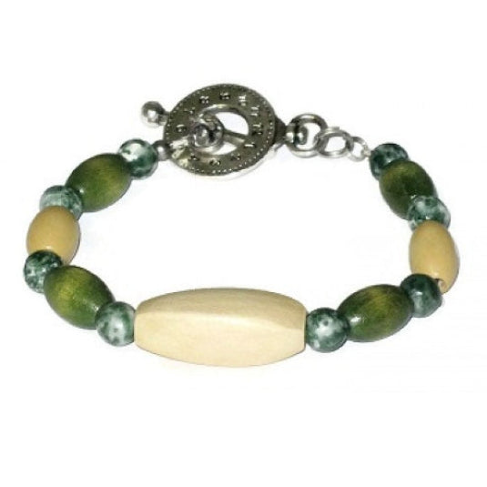 Bracelet with green and beige beads on a white background
