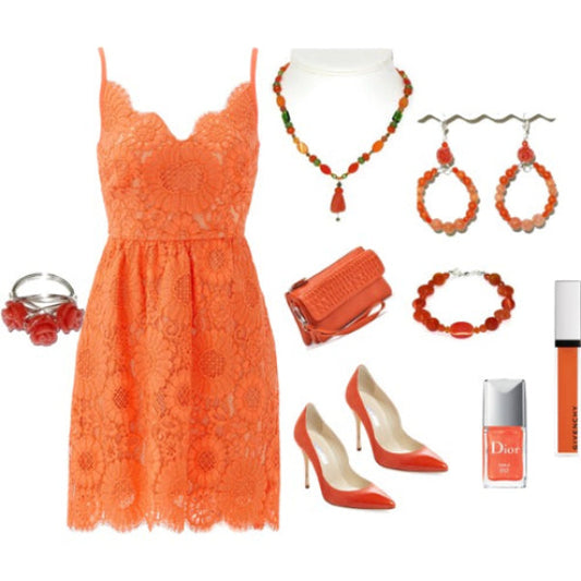 Orange lace dress with matching accessories on a white background