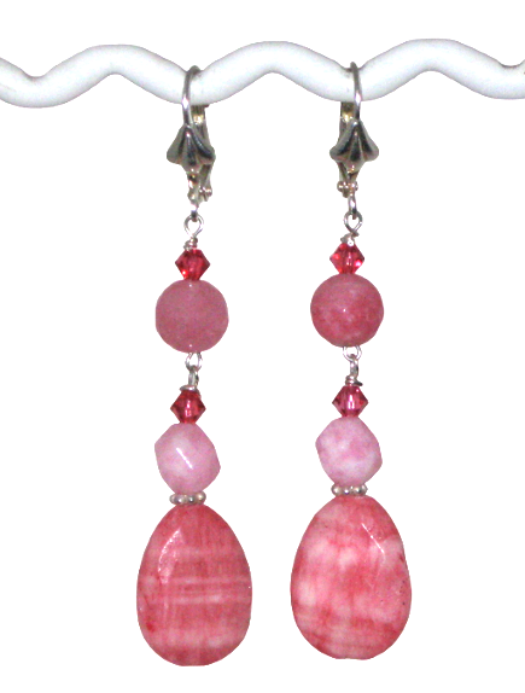 Pink beaded dangle earrings on a white background