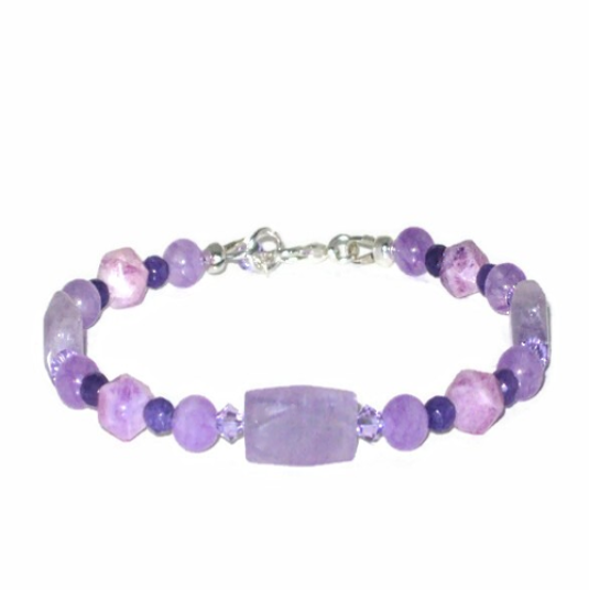 Purple beaded bracelet on a white background