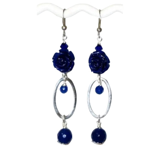 A pair of dark blue beaded earrings complemented with sterling-silver components featuring a carved flower bead on each earring.
