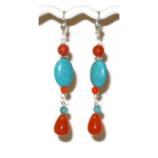 Pair of dangle earrings with turquoise and orange beads on a white background