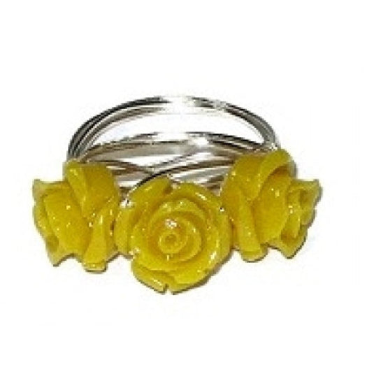 Three yellow carved flower wire-wrapped ring wrapped in silver-plated wire on a white background