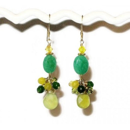 Beaded yellow and green dangle earrings featuring delicate faceted teardrop beads on a white background