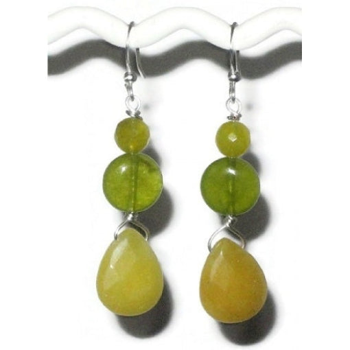 Yellow and peridot-colored green beaded earrings on a white background