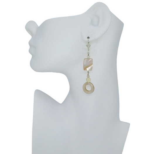 Handmade beige, ivory and cream dangle earrings with silver-plated Leverback on mannequin ear