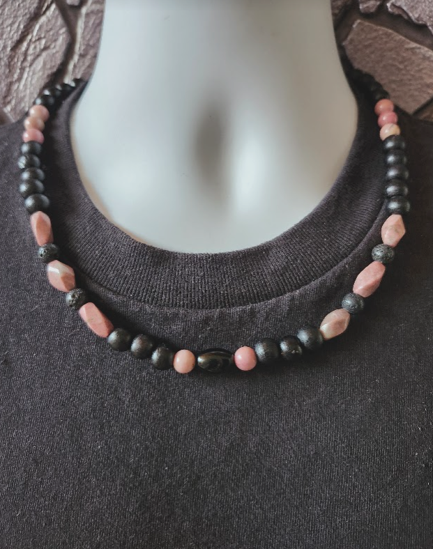 Men's black and mauve pink beaded necklace with wood, black onyx and rhodonite stone beads.