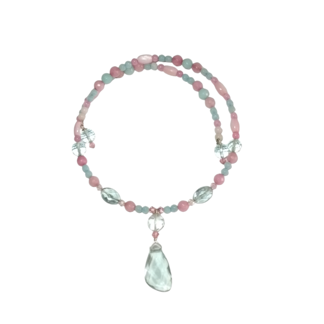 An expandable blush pastel pink and aqua beaded choker with a faceted aqua quartz pendant on a crisp white background.