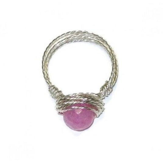 Silver-plated wire-wrapped ring with a pink gemstone on a white background