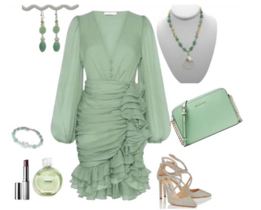 Mint green dress with matching accessories on a white background
