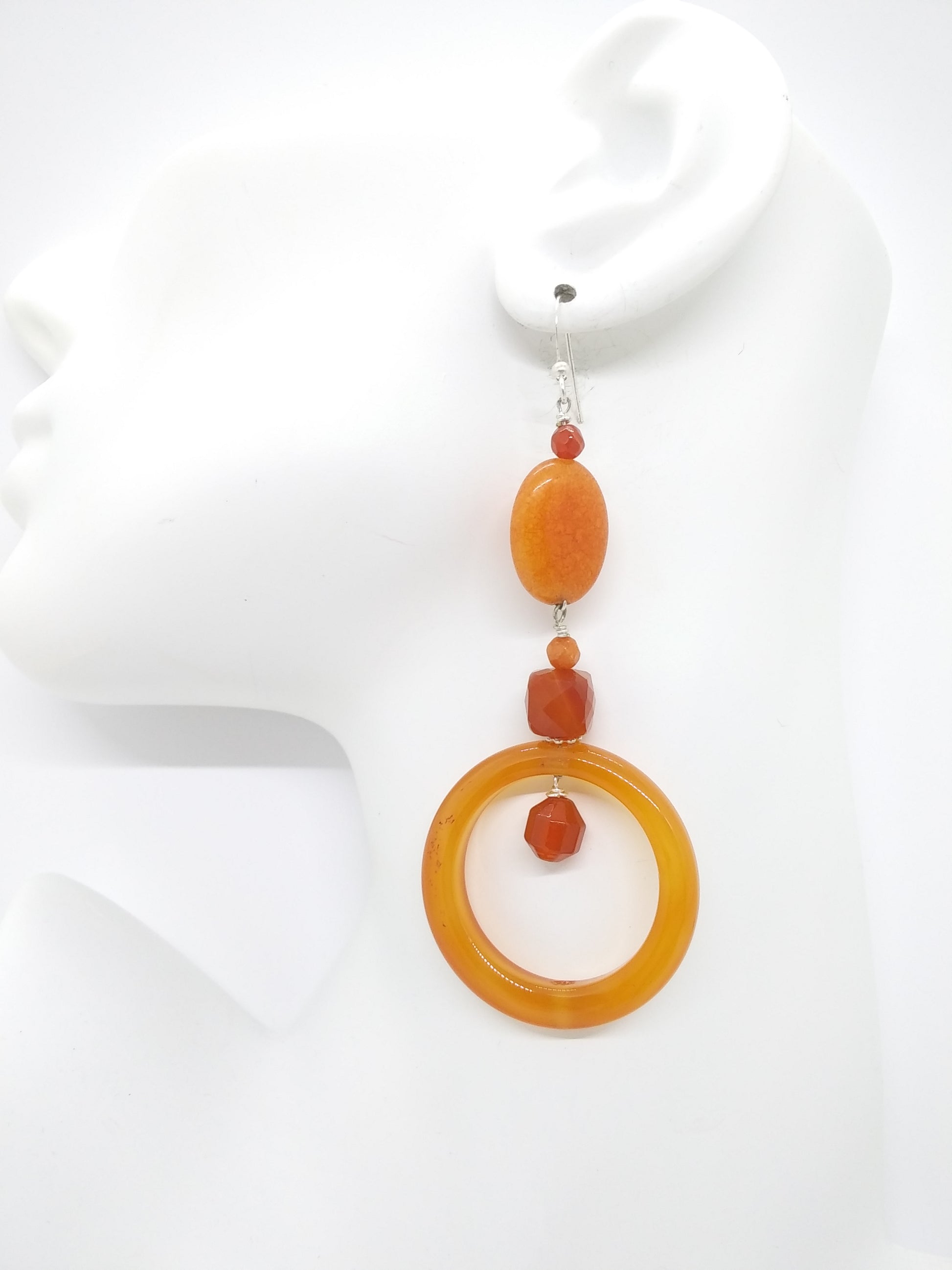 Orange carnelian statement hoop earrings handmade gemstone jewelry on a white background