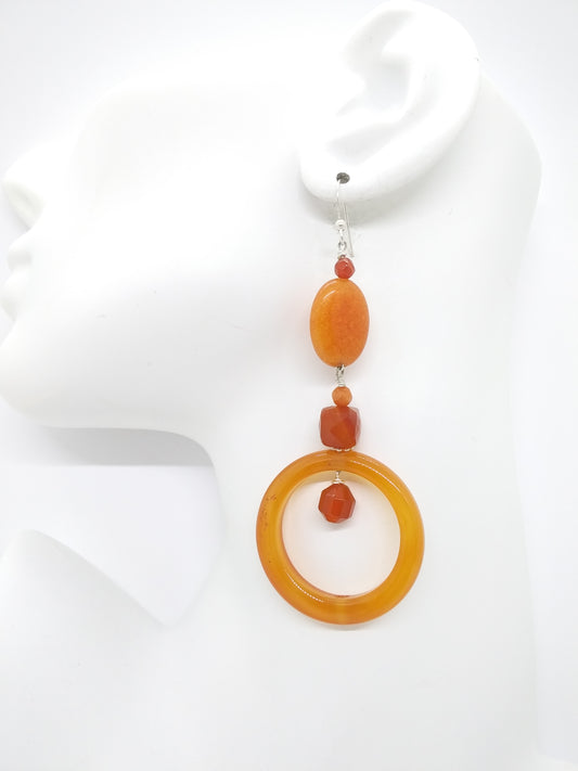 Orange carnelian statement hoop earrings handmade gemstone jewelry on a white background