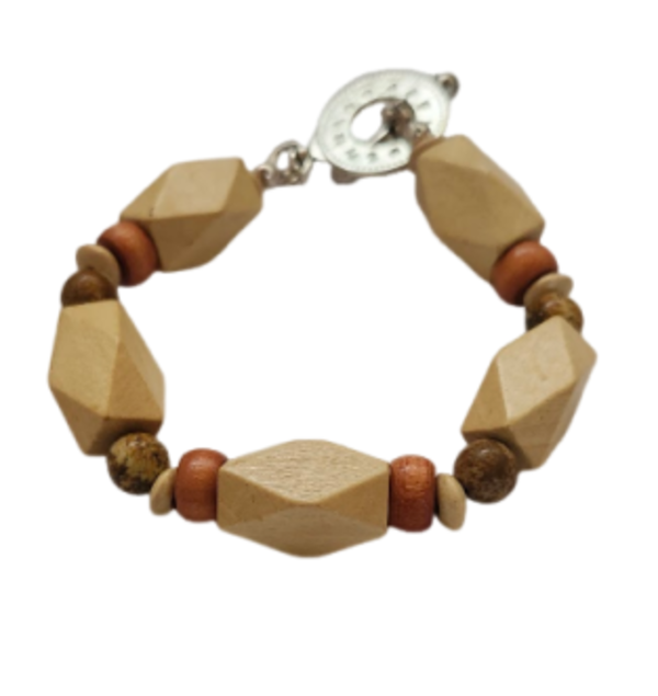 A beaded bracelet made of natural wood beads in beige, burnt orange and medium brown, with a silver-tone toggle clasp, shown on a plain white background.