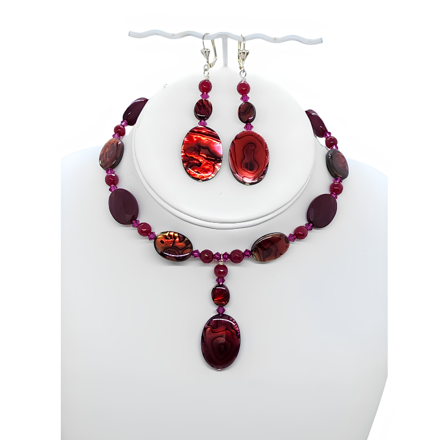 Choker and earrings set featuring abalone beads, and cranberry-colored crystals and  on a white mannequin bust