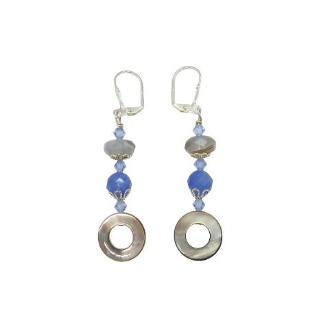 Pair of earrings with blue beads and circular metal elements on a white background