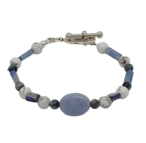 Men's bracelet featuring blue, gray, and white beads on a white background