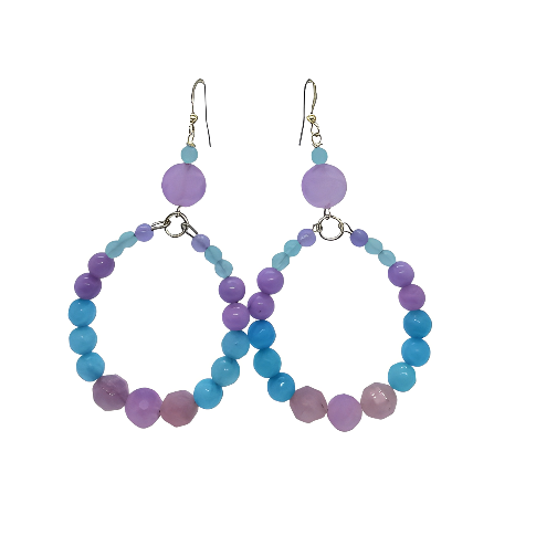 Hoop earrings with blue and purple beads on a white background