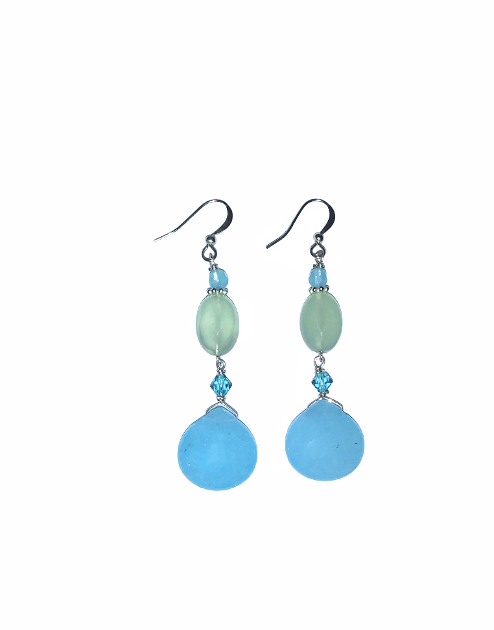 Pair of earrings with blue and green beads on a white background