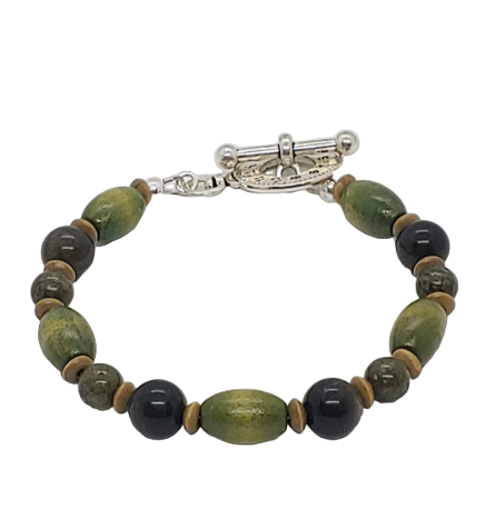 Men's bracelet with green and black beads on a white background