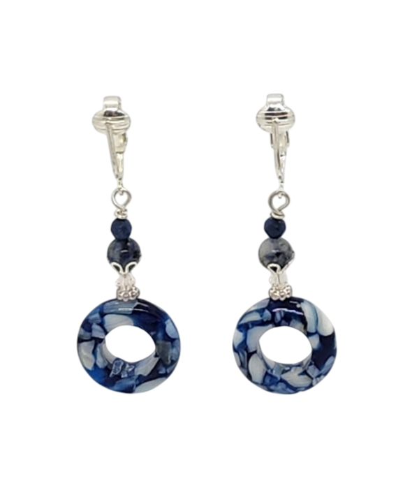 A pair of silver-toned drop clip-on earrings with blue-and-white marbled mother-of-pearl dangles, accent beads, and detailed caps.