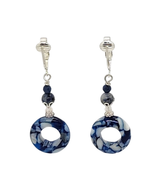 A pair of silver-toned drop clip-on earrings with blue-and-white marbled mother-of-pearl dangles, accent beads, and detailed caps.