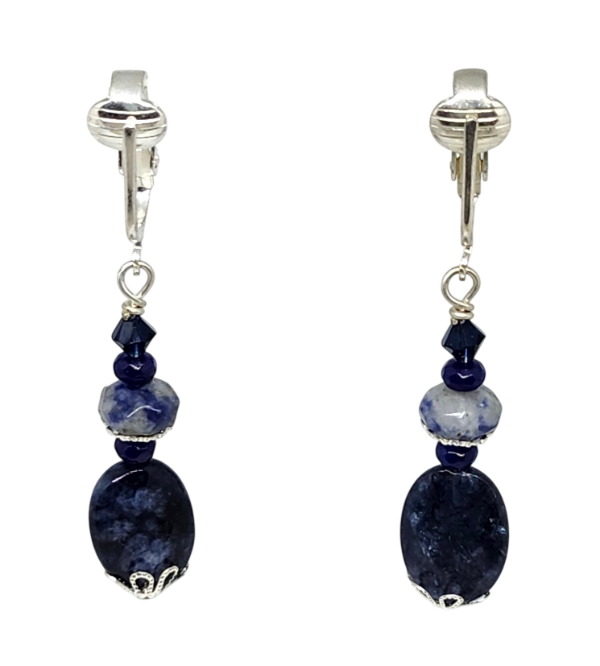 A pair of dangle clip-on earrings with navy semi-precious stones and navy crystals.