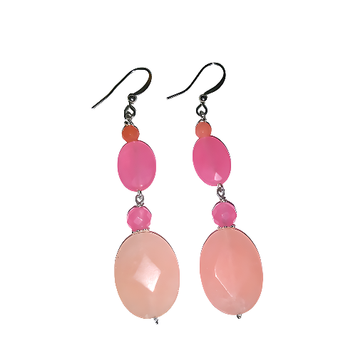 Pair of earrings with pink and peach-colored beads on a white background