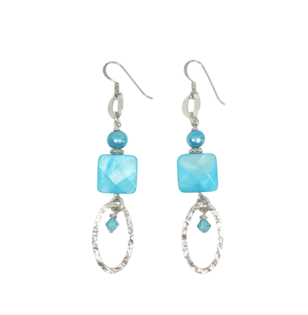 A pair of sterling silver dangle earrings featuring sky blue faceted mother-of-pearl beads, Swarovski crystals and freshwater pearls. 