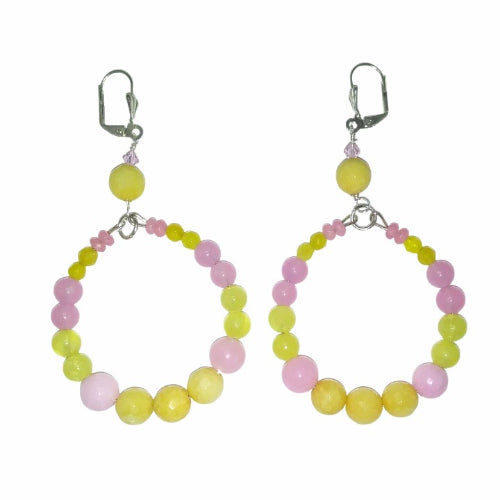Pair of pink and yellow statement hoop earrings made with smooth and faceted jade beads and crystals on white background